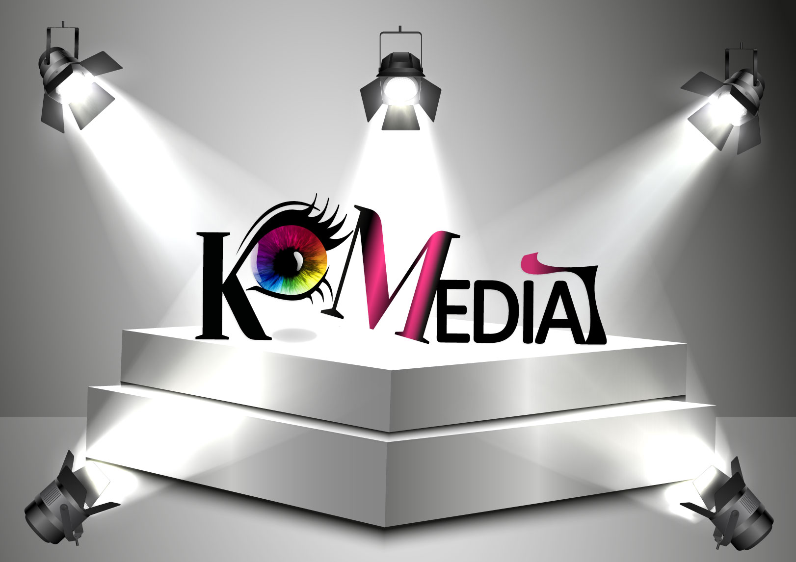 Logo de Komedia Graphiste Toulouse mis en lumiere